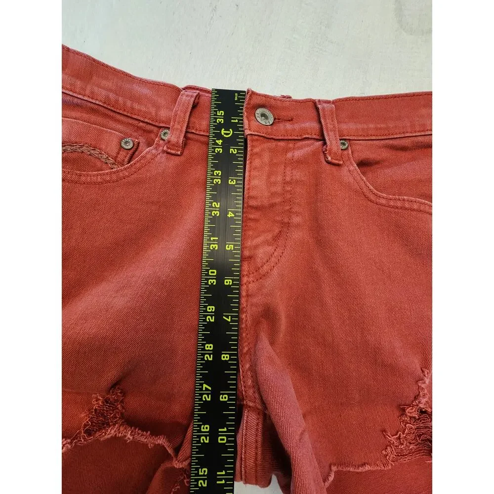Levis Women's Cut off Denim Shorts SZ 4 Distressed Butterfly Patch Rust